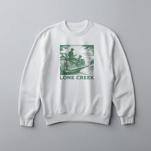 Sage green woodcut illustration of figure and dog on truck tailgate, printed on a White midweight sweatshirt.