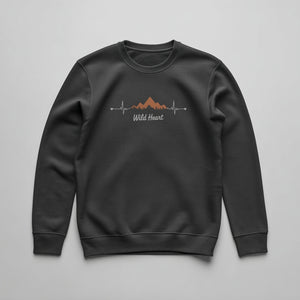Mountain silhouette with coral gradient and white EKG heartbeat line on a Charcoal midweight fleece crewneck sweatshirt.