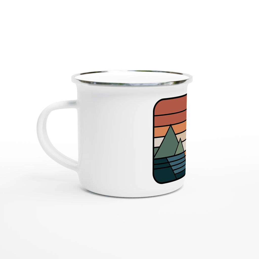 White mug with a colorful mountain design on a white background