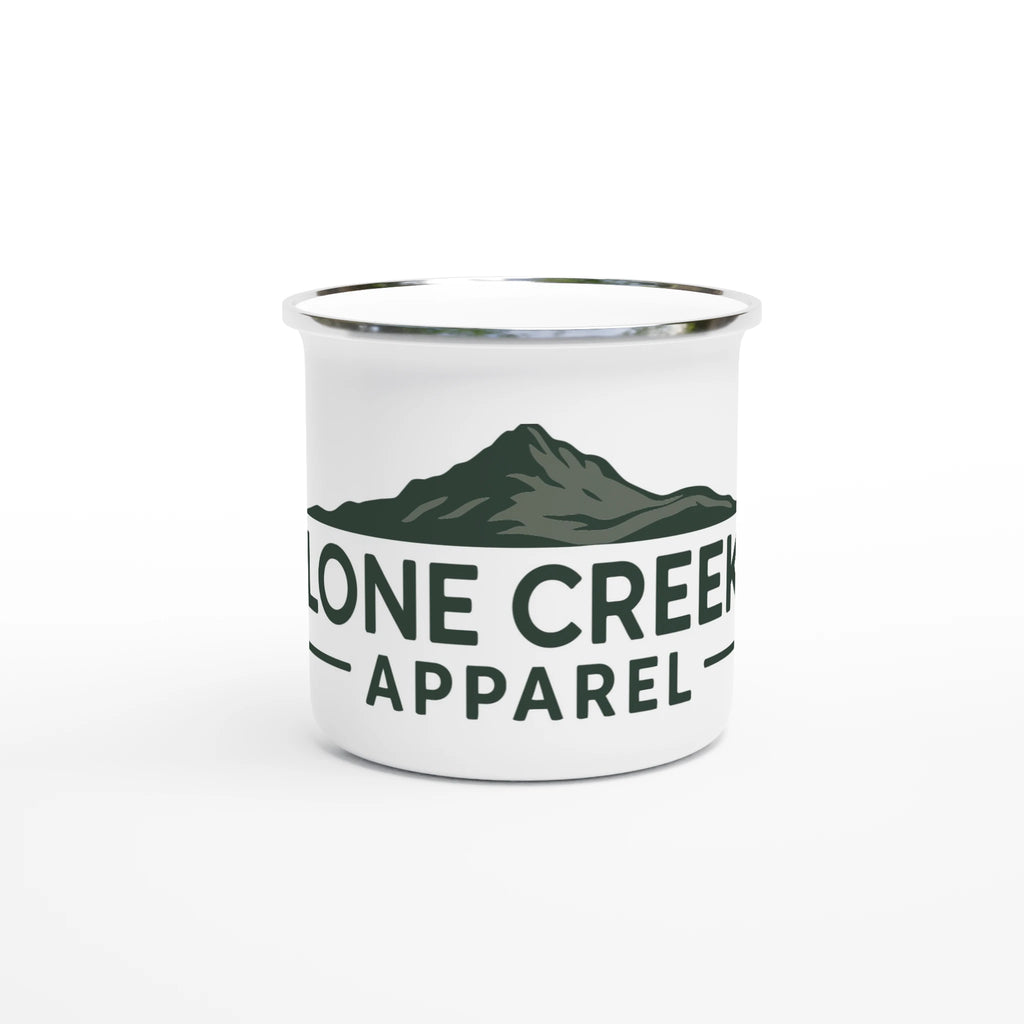 White mug with a mountain design and 'Lone Creek Apparel' text on a white background