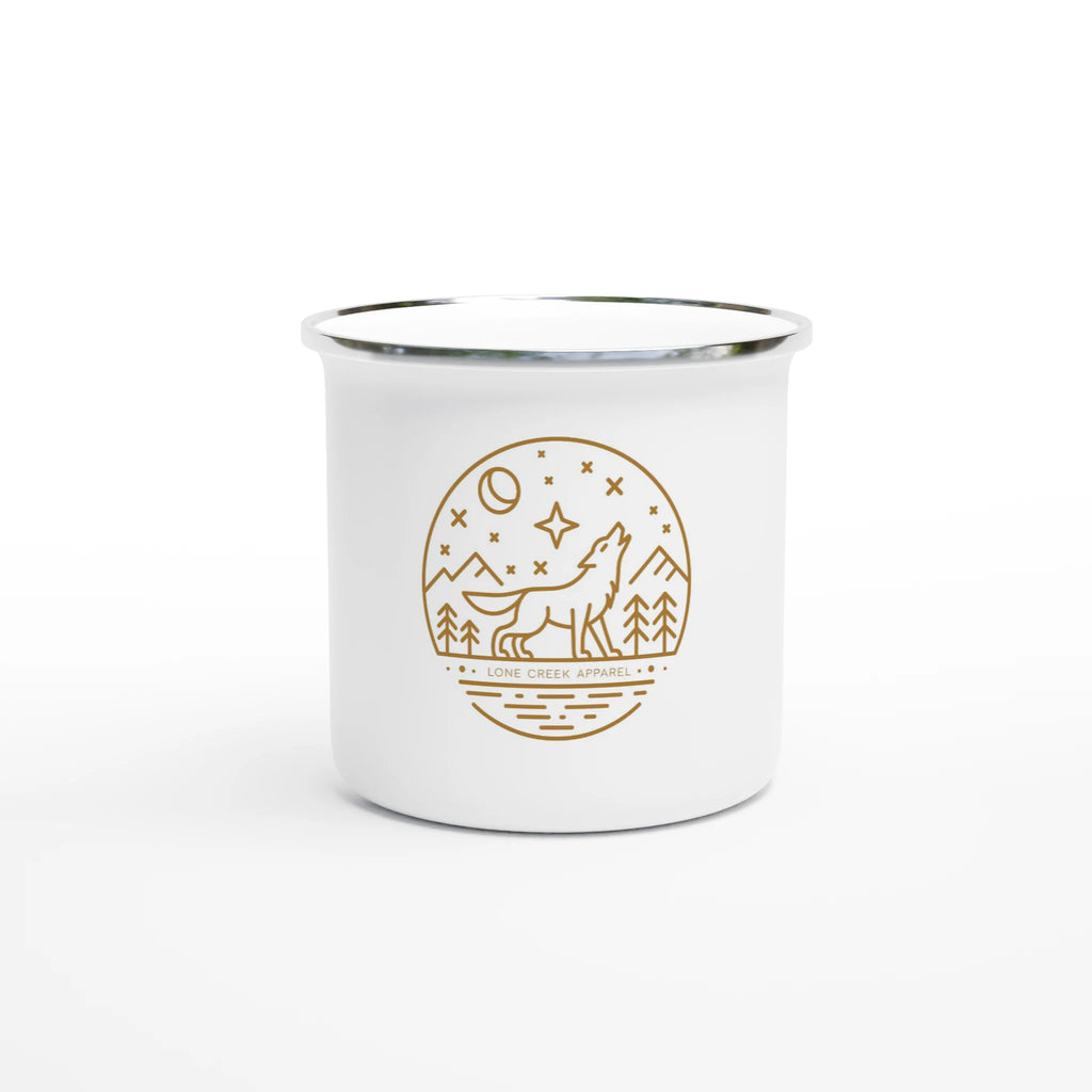 White mug with gold wolf design on a white background