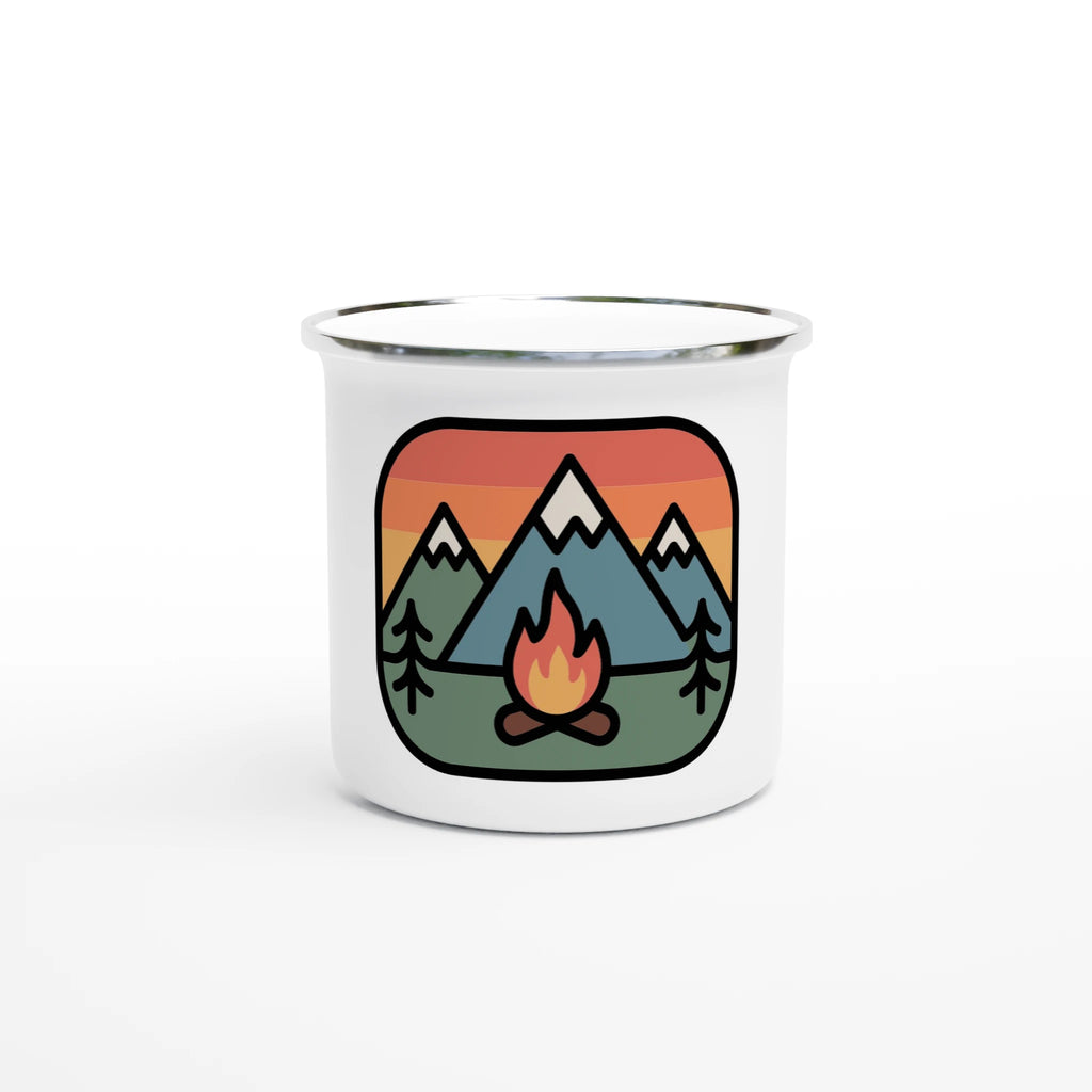White mug with a mountain and campfire design on a white background