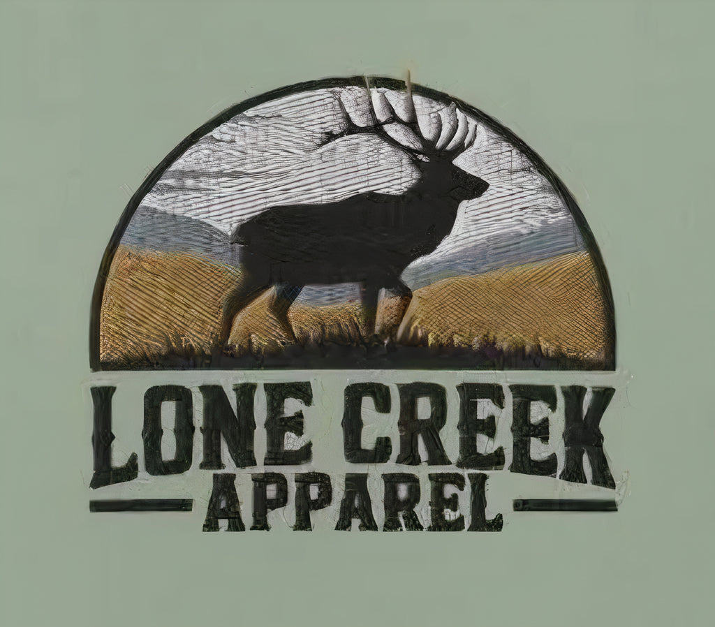 Embroidered patch with a silhouette of a deer and 'Lone Creek Apparel' text on a light green background