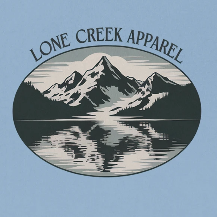 Lone Creek Apparel logo with mountains and lake on a light blue background