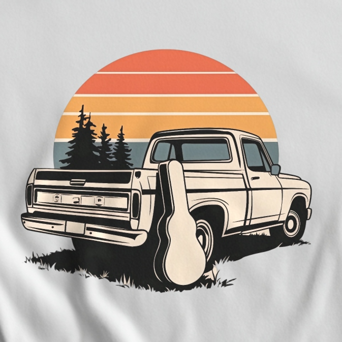 Vintage-style graphic of a truck and guitar with a sunset and trees on a white background