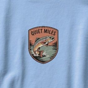 Logo with a fish and 'Quiet Miles' text on a light blue background