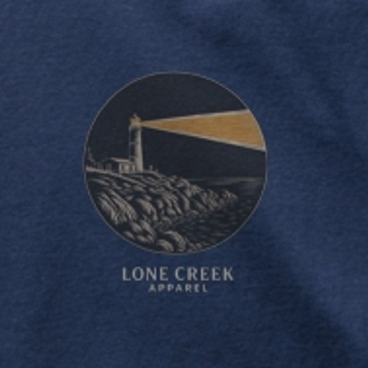 Navy blue fabric with a circular design featuring a lighthouse and the text 'Lone Creek Apparel'.