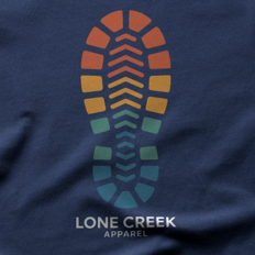 Geometric gradient footprint graphic on a Navy 100% cotton tee.