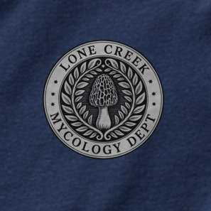 Detail of black morel mushroom emblem graphic on a Navy cotton tee