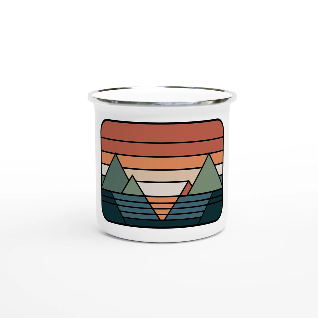White mug with a colorful mountain design on a white background
