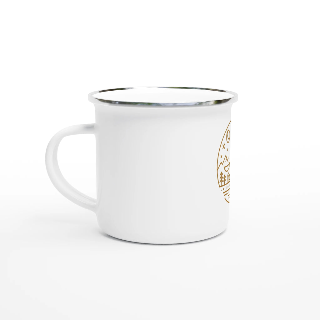 White mug with gold design on a white background