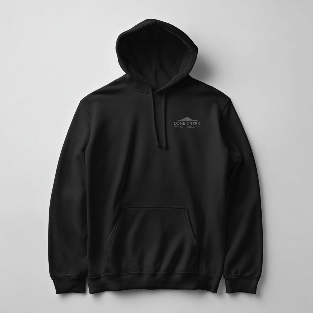 Line art mountain landscape graphic on the back of a Black midweight fleece hoodie background