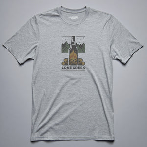Multi-colour campfire bottle graphic with mountains and stars on a Heather Storm graphic tee.