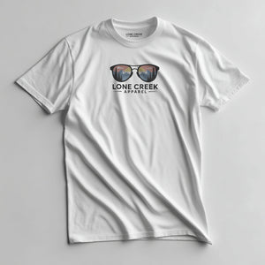 Mountain sunglasses graphic with sunset scene on a White lightweight cotton tee.