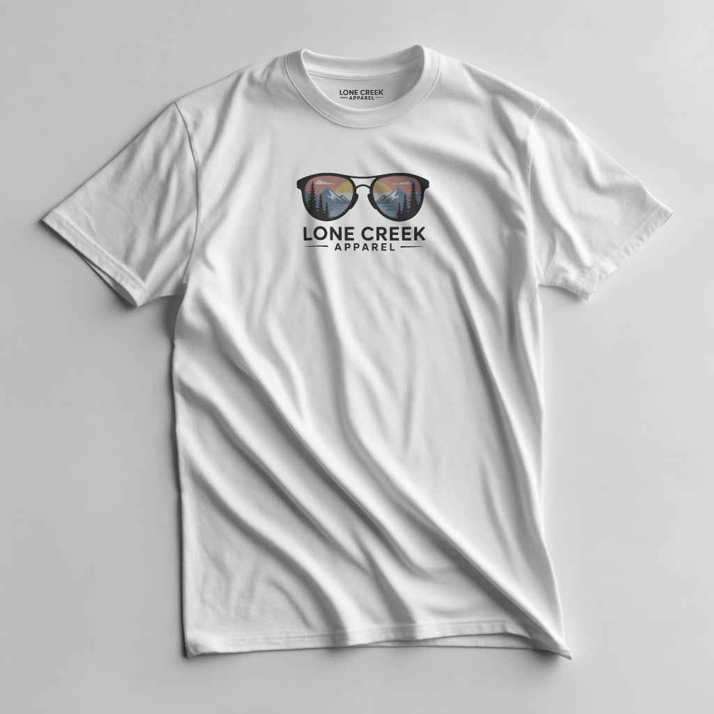Mountain sunglasses graphic with sunset scene on a White lightweight cotton tee.