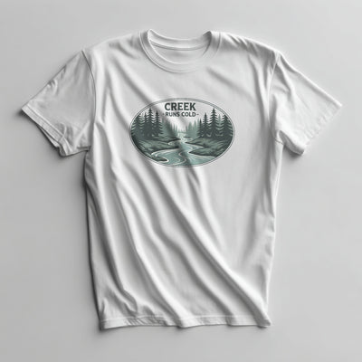 Oval creek and pine forest graphic with Creek Runs Cold text in greens on a White graphic tee