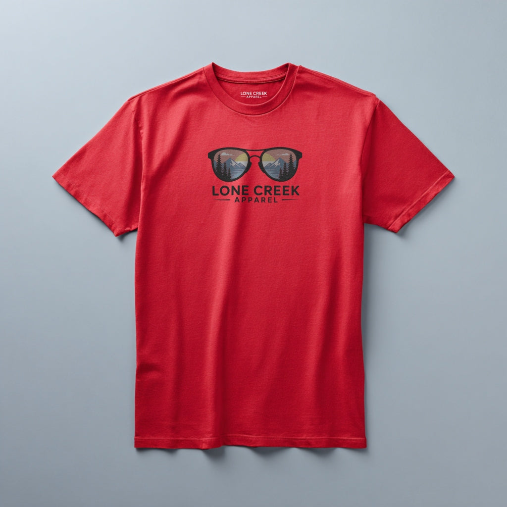 Mountain sunglasses graphic with sunset scene on a Red lightweight cotton tee.