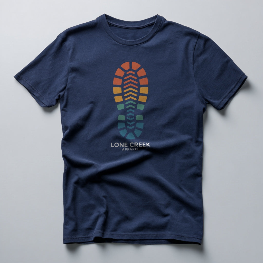 Geometric gradient footprint graphic on a Navy 100% cotton tee.