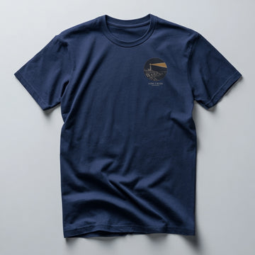 Vintage lighthouse graphic in a circular frame on an Atlantic Navy graphic tee
